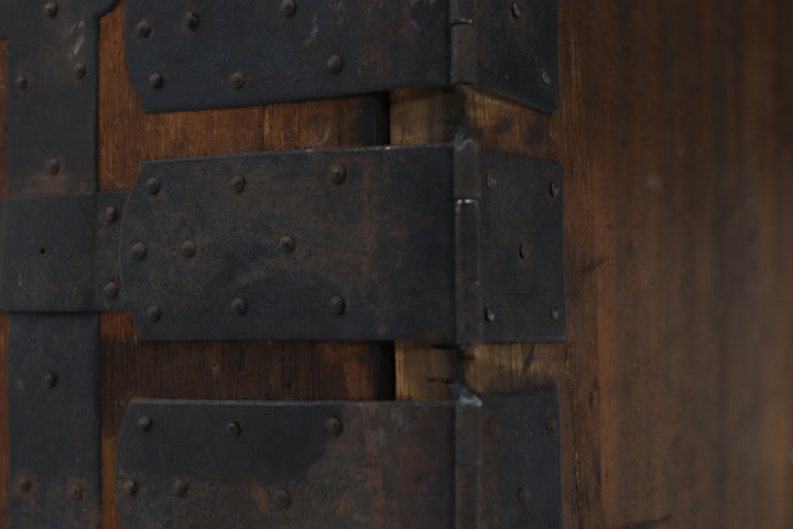 Vintage handmade wooden tansu chest with metal details 