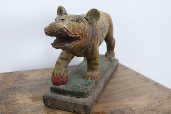 Vintage handmade 19th century wooden tiger with painted details 