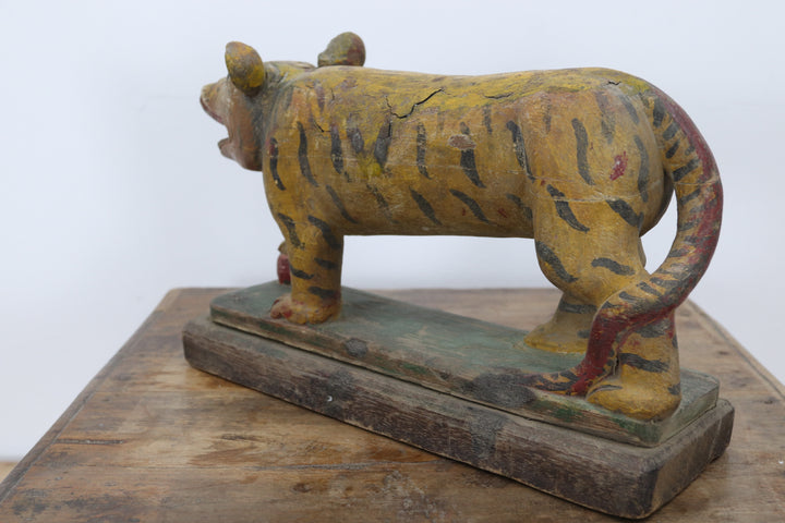 Vintage handmade 19th century wooden tiger with painted details 