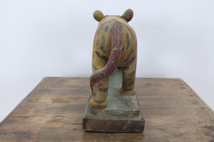 Vintage handmade 19th century wooden tiger with painted details 