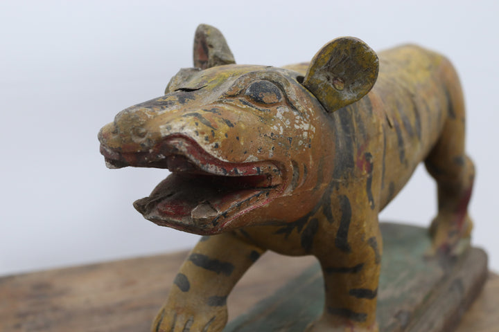 Vintage handmade 19th century wooden tiger with painted details 