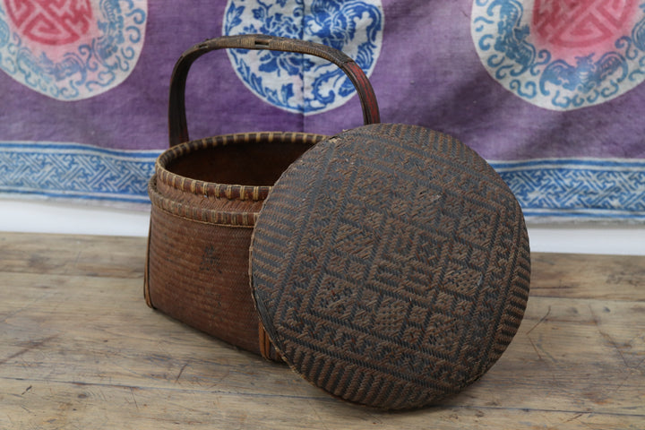 Vintage handmade asian storage basket 