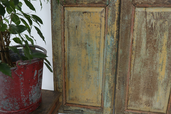 Vintage handmade 19th century indian doors in textured paintwork 
