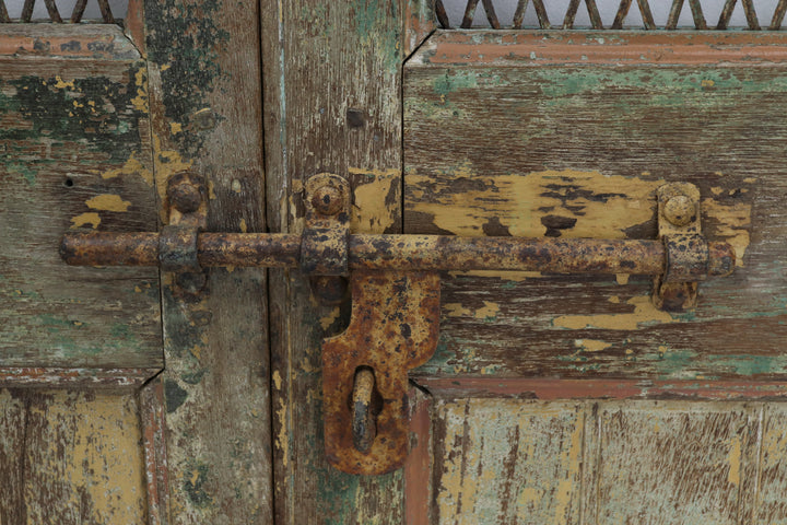 Vintage handmade 19th century indian doors in textured paintwork 
