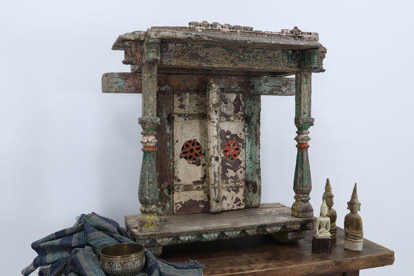 Vintage wooden asian cabinet with carved details 
