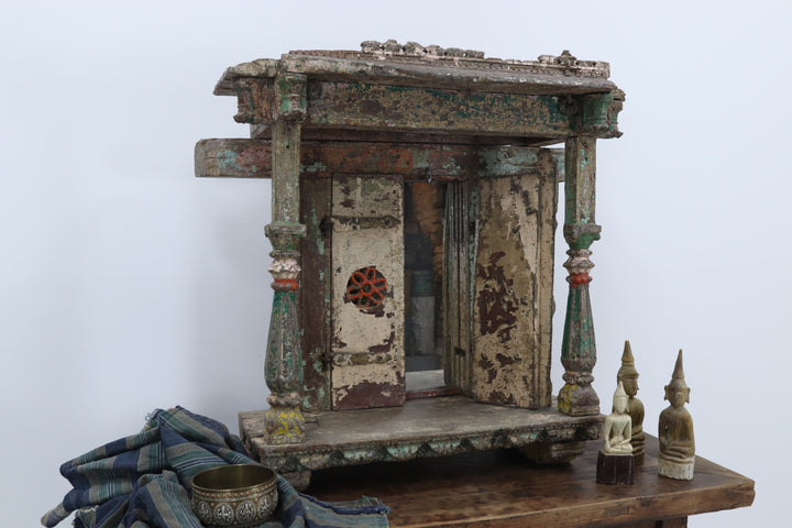 Vintage wooden asian cabinet with carved details 
