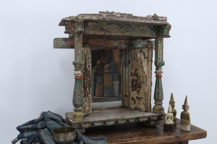 Vintage wooden asian cabinet with carved details 
