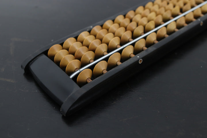 Vintage handmade asian abacus with carved details 