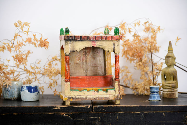 Vintage asian buddhist temple shrine with painted details 