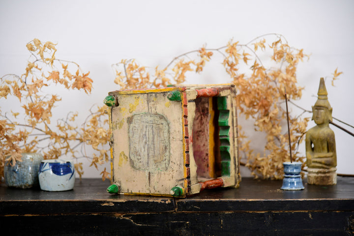 Vintage asian buddhist temple shrine with painted details 