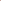 A glossy ceramic or stone decorative object with a red and cream gradient finish, displayed on a light wood surface next to two vintage-style brushes against a plain white wall.