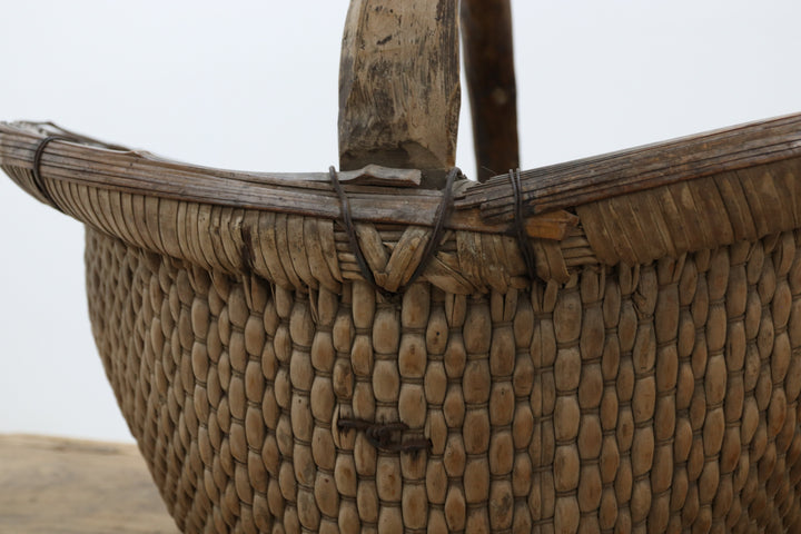 Vintage woven asian basket with handle 