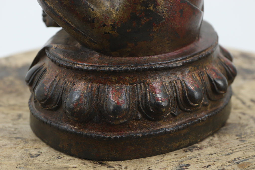 Vintage metal gold leaf and red lacquer buddha