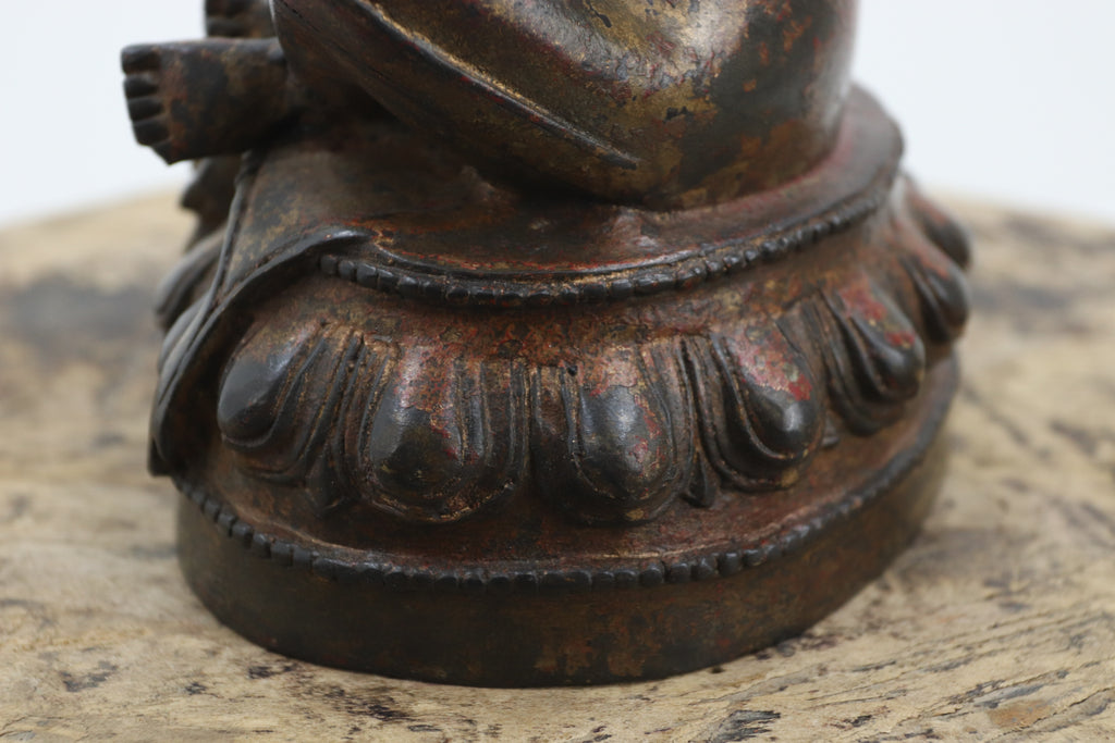 Vintage metal gold leaf and red lacquer buddha