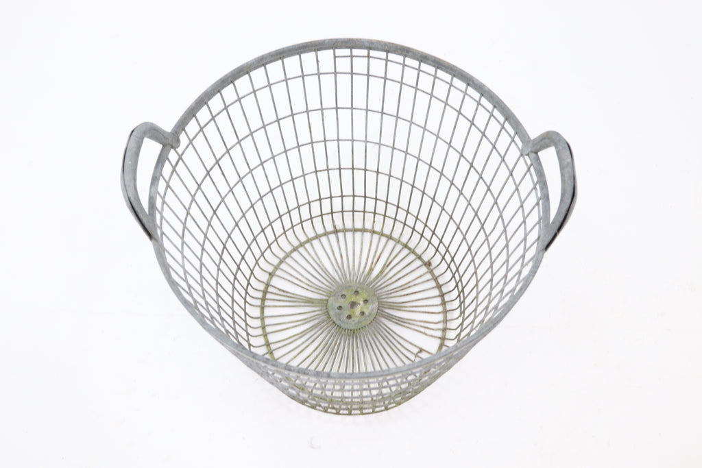 Antique woven metal basket