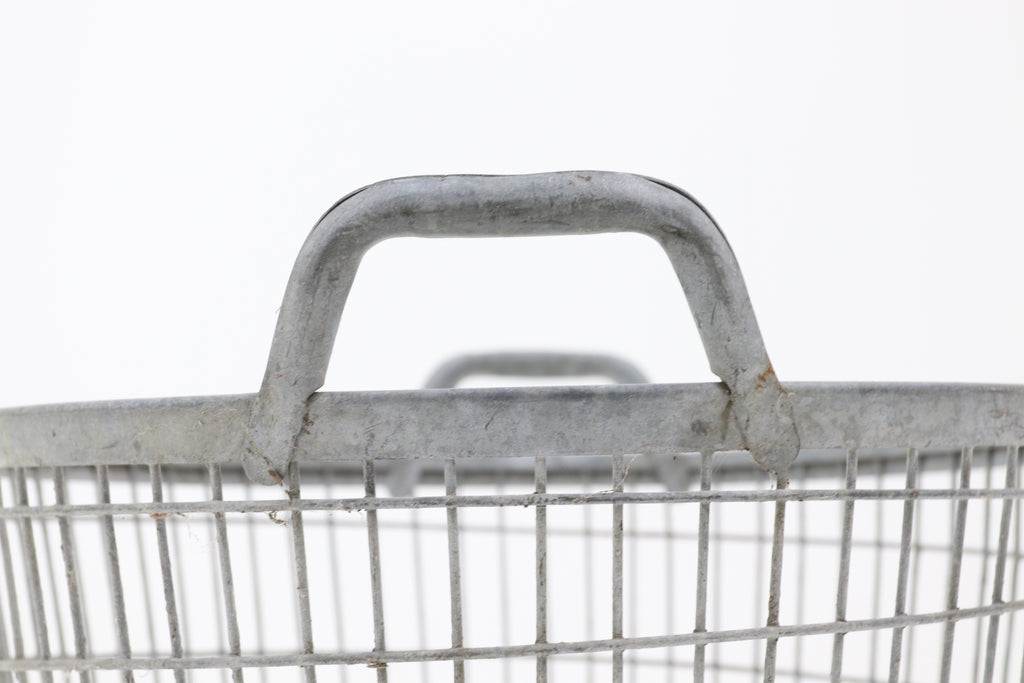Antique woven metal basket